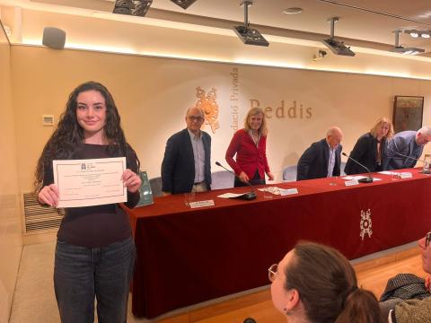 Eva Garcia receiving the award